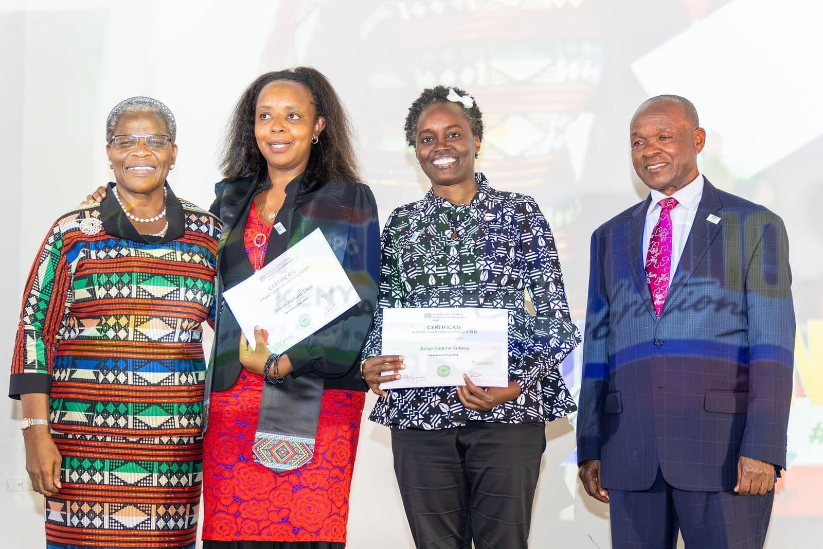 Graduates with SPPG leadership and guests