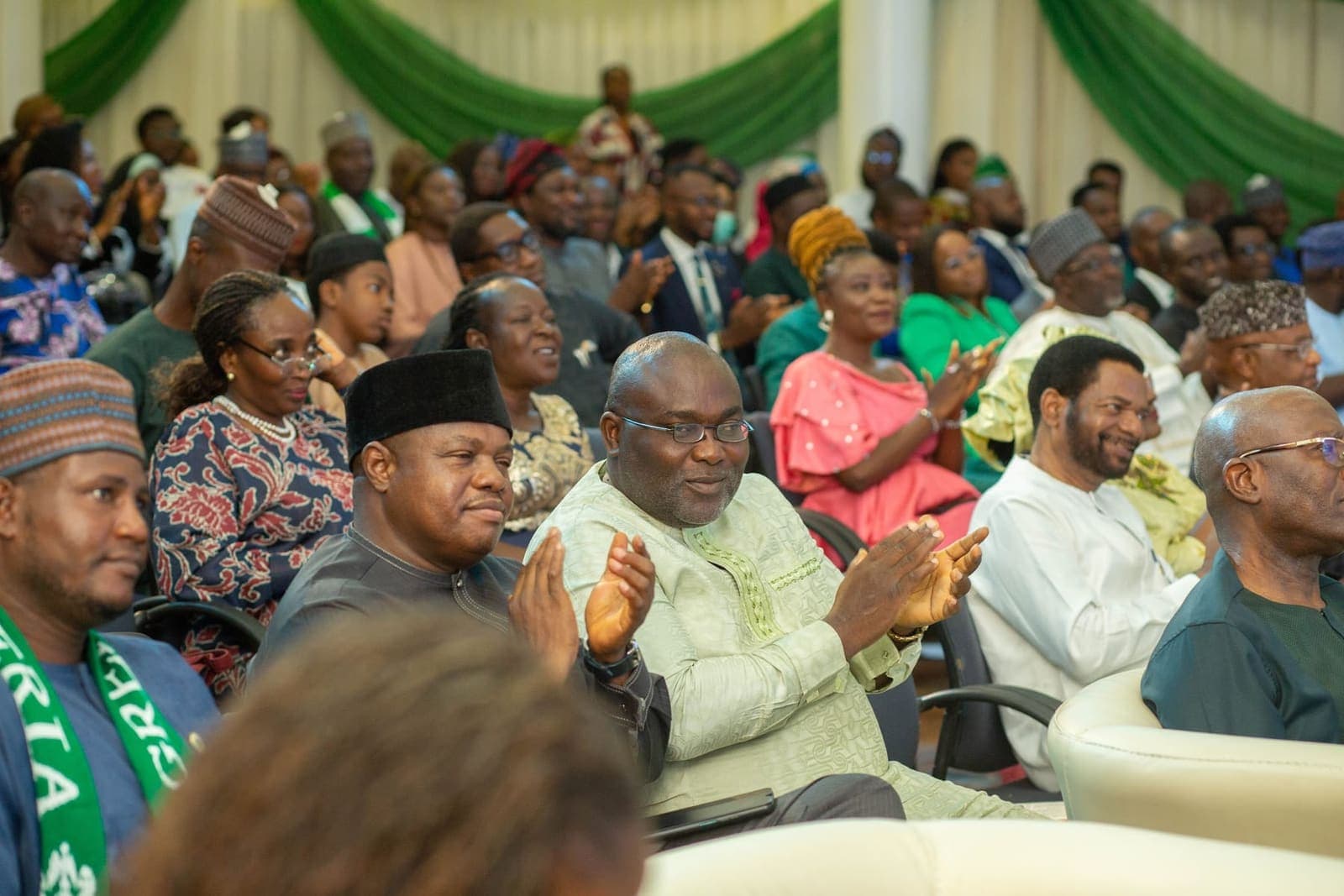 Guests applaud the graduands